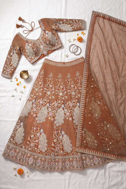 Rust Orange Silk Bridal Lehenga Choli With Heritage Dori And Peacock Embroidery