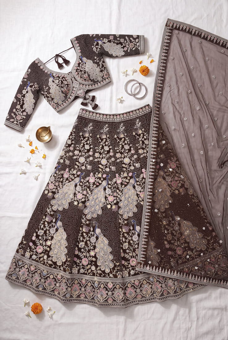 Women's Heavy Embroidered Net Lehenga Choli in Deep Wine with Peacock Motifs and Net Dupatta