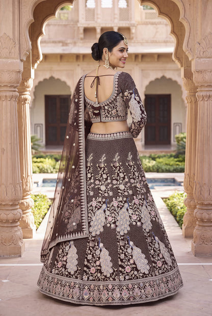 Women's Heavy Embroidered Net Lehenga Choli in Deep Wine with Peacock Motifs and Net Dupatta