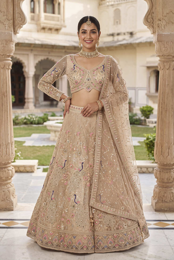Elegant Floral Patterned Net Lehenga Set in Beige with Embellished Blouse and Dupatta with light gold colour.