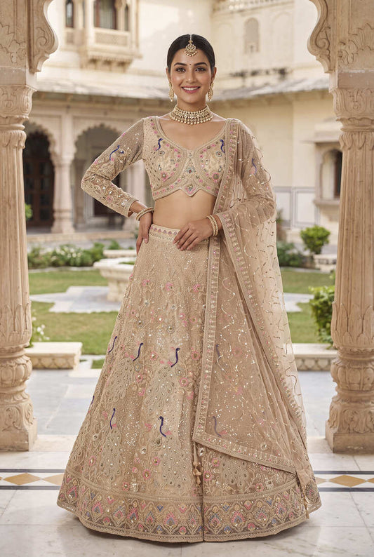 Elegant Floral Patterned Net Lehenga Set in Beige with Embellished Blouse and Dupatta with light gold colour.