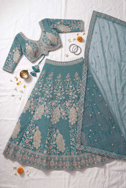 Elegant Teal Blue Embroidered Lehenga Choli with Peacock Motif and Matching Dupatta