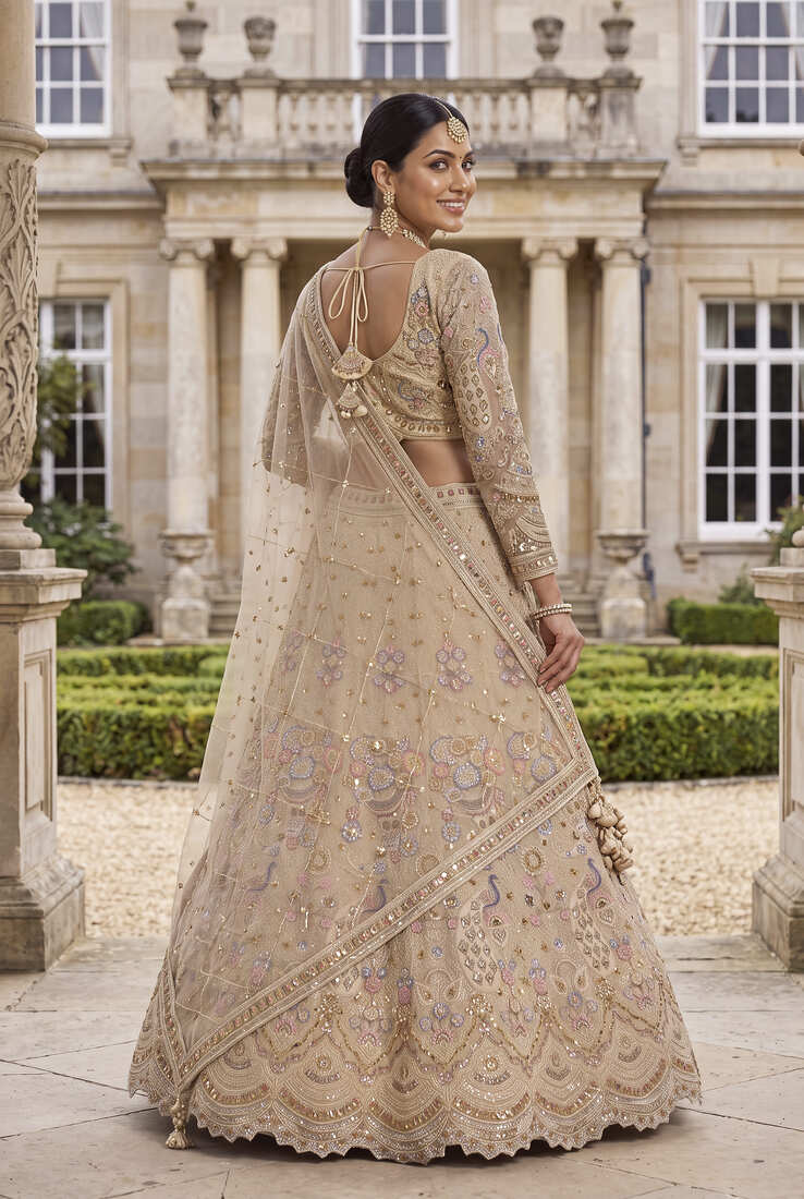 Light skin colour Beige Embroidered Bridal Lehenga Choli with Pastel Floral Motifs and Detailed Zardosi Work