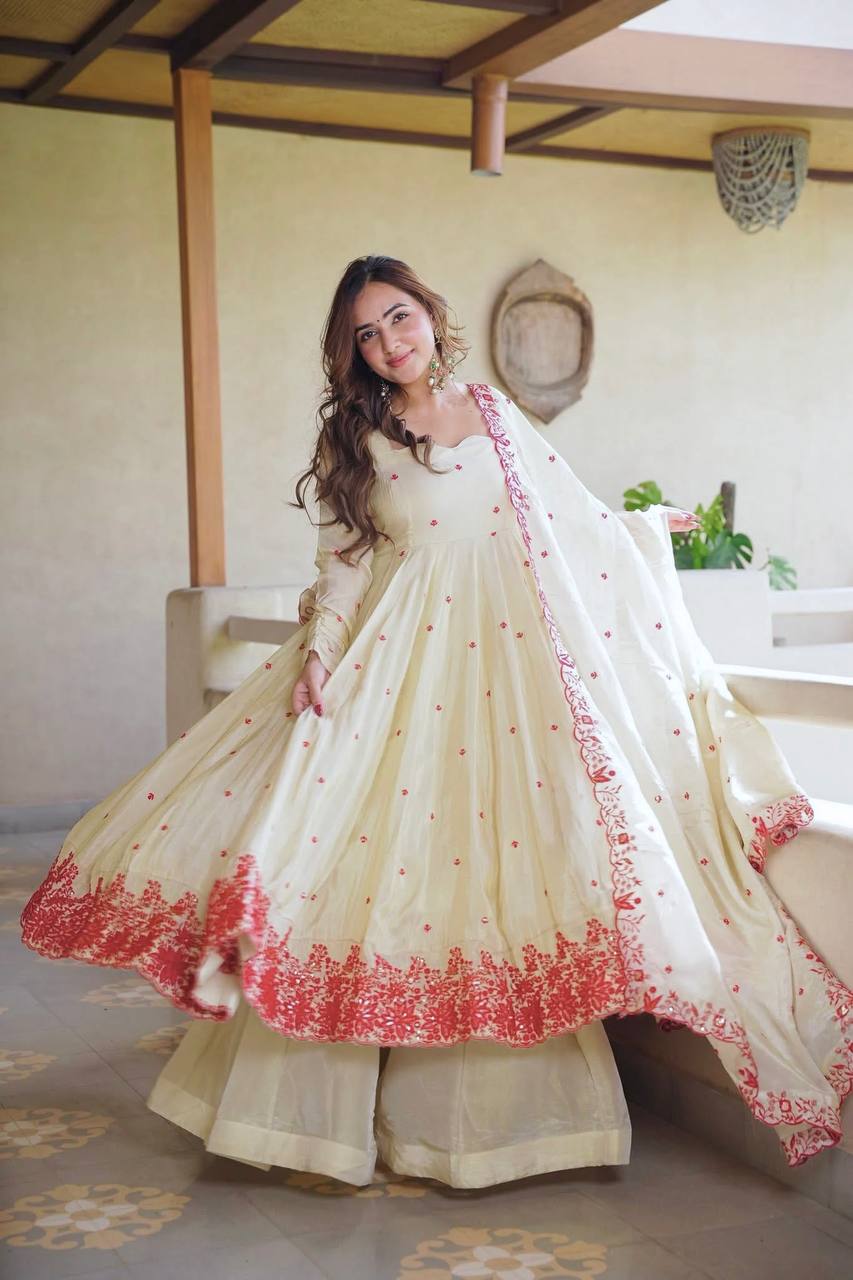 Elegant ivory anarkali suit with embroidery.