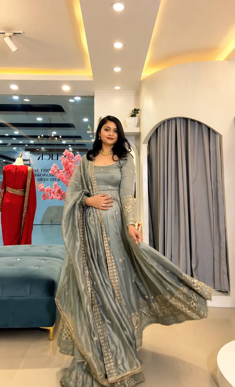 Embroidered Anarkali gown with matching dupatta.