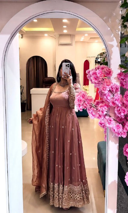 Embroidered Anarkali gown with matching dupatta.