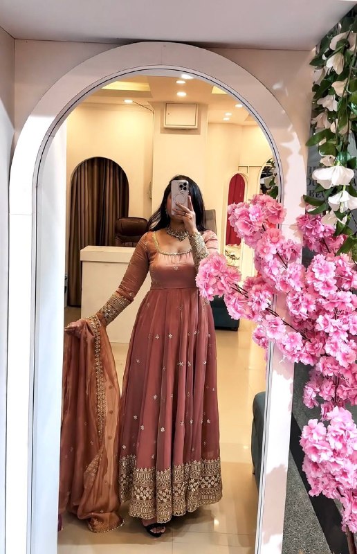 Embroidered Anarkali gown with matching dupatta.